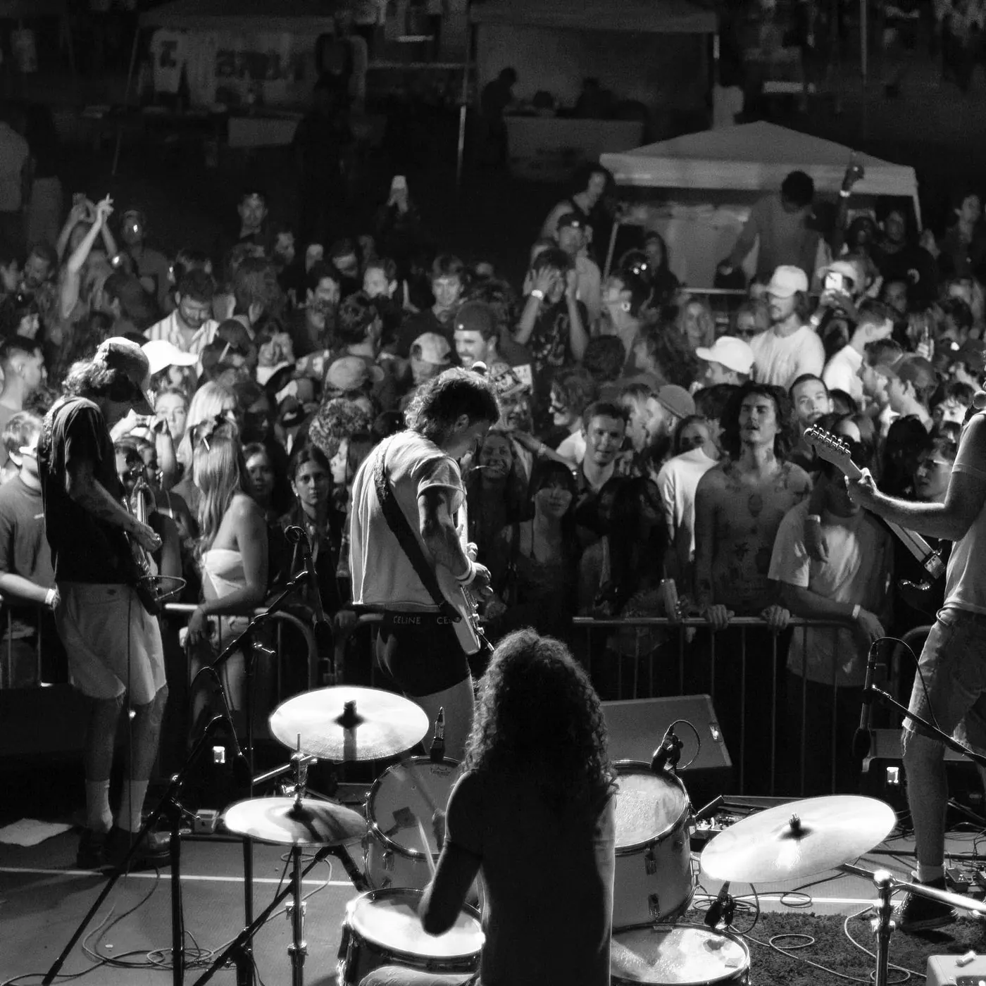 Black and white view from behind the drums at Local Lineup